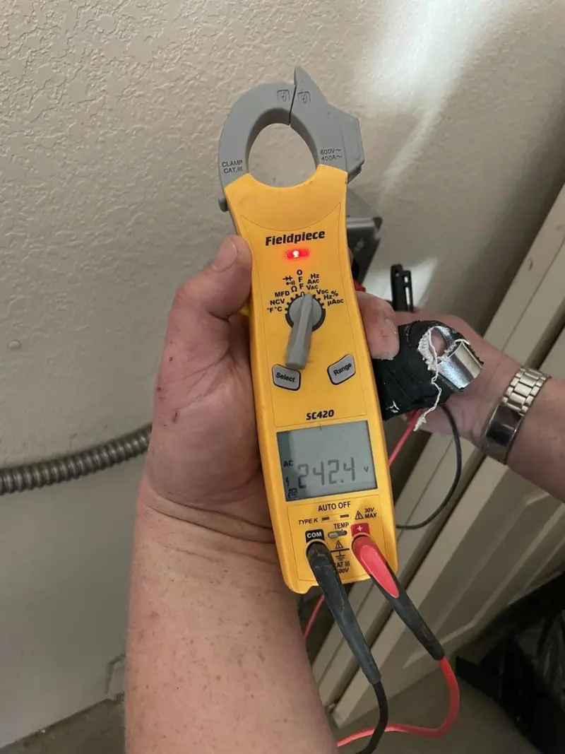 Voltage testing with clamp meter during Generator Installation in Chubbuck